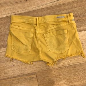 Cut off yellow shorts